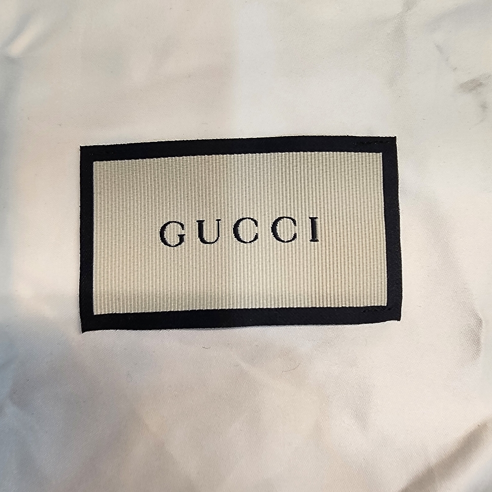 Gucci duster bag (Gucci jewelry or wallet)